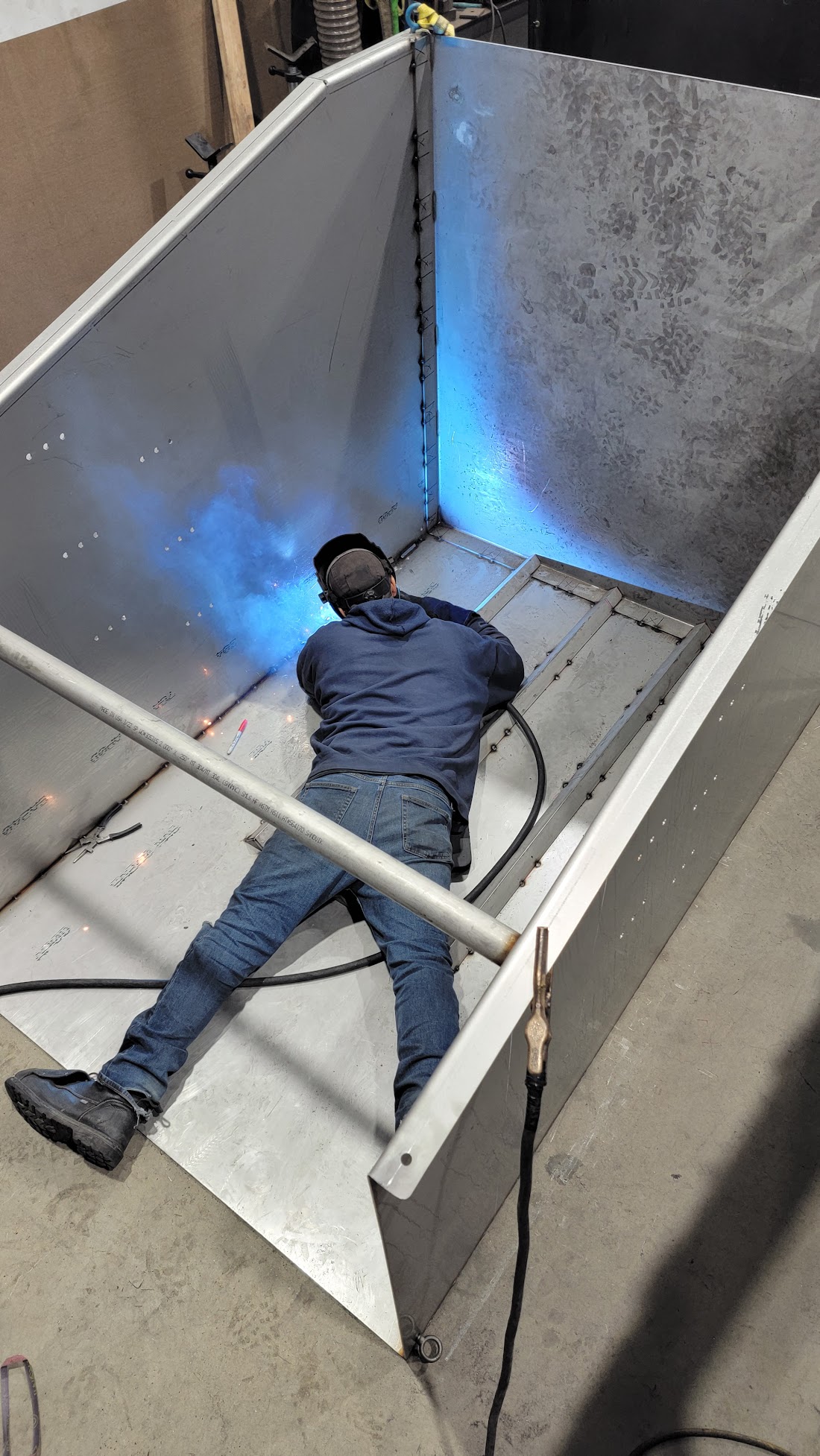 Me welding inside the dumper